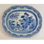 An English blue and white transfer printed ceramic platter with giraffe and camel in a Chinese