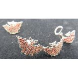 A Vanessa Pederzani from the 'Dark Kingdom' collection 'bat' ear cuff and earrings. Rubies approx