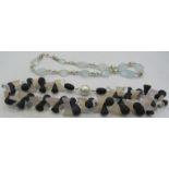 A topaz & white metal necklace with 925 marked lobster clasp, approx 18" long and a black onyx &