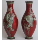 A pair of Japanese cloisonné enamelled vases, Meiji period. Decorated with cockatoos perched on