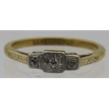 An 18ct yellow gold & platinum, three stone diamond ring, centre diamond approx 0.5ct, size M,