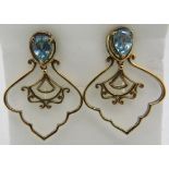 Blue zircon gemstone earrings, post back. 30mm length, 14k yellow gold overlay, stamped 925.