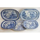 Five English blue and white transfer printed ‘Willow’ pattern ceramic platters, 19th century. (5