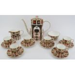 A Royal Crown Derby Old Imari pattern porcelain coffee set. Comprising a coffee pot, a sugar bowl