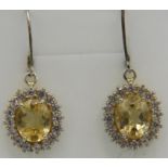 A pair of D' joy citrine earrings, lever back 925 sterling silver. 16mm x 14mm portrait setting.