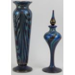 An Okra iridescent glass vase and scent bottle with stopper, late 20th century. (2 items) 9.5 in (24