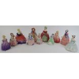 A group of eleven Royal Doulton figurines. Comprising ‘Lady Fayre’ HN 1265, ‘Dainty May’ HN 1639, ‘