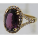 A fine natural Myanmar (Burma) spinel & diamond 18ct yellow gold ring. The spinel is pinkish/