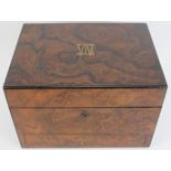 A Victorian walnut dressing table box. Compartmented interior with hidden compartment to the lower