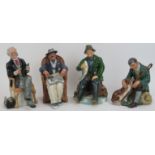 A group of four Royal Doulton figurines. Comprising ‘The Master’ HN 2325, ‘A Good Catch’ HN 2258, ‘