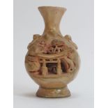 An unusual Chinese twin handled pottery vase, 20th century. Decorated with an entrance to a city