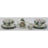 A group of German Meissen and related miniature porcelain wares, 20th century. Comprising a pair
