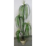 An artificial ponytail palm tree in a relief moulded planter. H120cm (approx). Condition report: