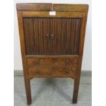 A George III mahogany gentleman’s vanity unit, the doors opening onto a fitted interior with