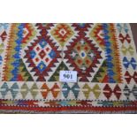 A fine Chobi Kilim rug. Good vibrant colours and in excellent condition. 150cm x 101cm.