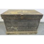 A 19th century metal bound carpenter’s trunk, the bespoke mahogany fitted interior housing a