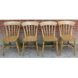 A set of four beech slat-back farmhouse kitchen chairs, on turned canted supports with an ‘H’