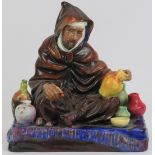 A Royal Doulton ‘The Potter’ figurine. HN 1493. 6.9 in (17.5 cm) height. Condition report: Good