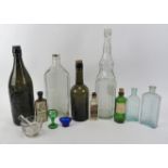 A collection of vintage and antique glassware. Comparing nine Chemists, medication and alcohol