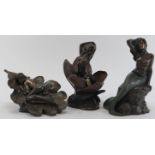 A group of three bronzed erotic female figures, late 20th century. Comprising a mermaid on a rock, a