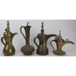 A group of Middle Eastern Dallah's and a ewer, probably 19th century. (4 items) 11.9 in (30.3 cm)