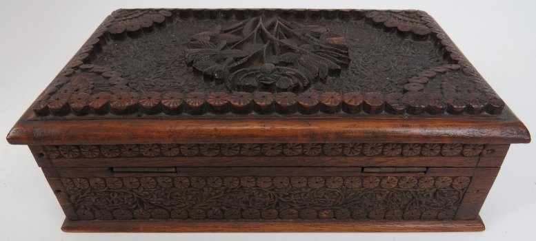 Two Indian carved wood objects, 20th century. Comprising an ornately carved box with hidden - Image 5 of 7