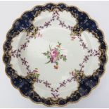 An early Worcester gilt and polychrome enamel decorated porcelain plate, 18th century. George III