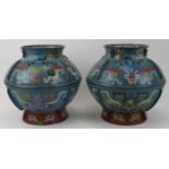 A large pair of Chinese cloisonné bowls with covers, 20th century. Modelled with archaistic