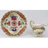 A Chamberlain’s Worcester ‘Dragon in Compartments’ pattern polychrome porcelain plate and milk