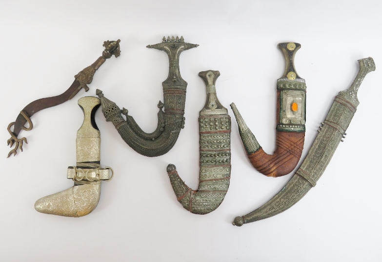 A group of five Middle Eastern Jimbaya daggers and a Tibetan Dorje ceremonial dagger, 20th
