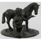 A bronzed figural group depicting a miner and pit pony, 20th century. Inscribed ‘L/E 500/72’ to