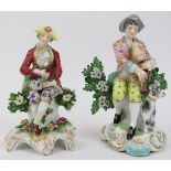 Two Samson polychrome decorated porcelain figurines, 19th century. Gilt painted anchor marks to both