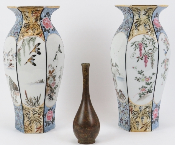 A pair of Japanese porcelain vases and a small bronze vase, late Meiji/early Taisho period.