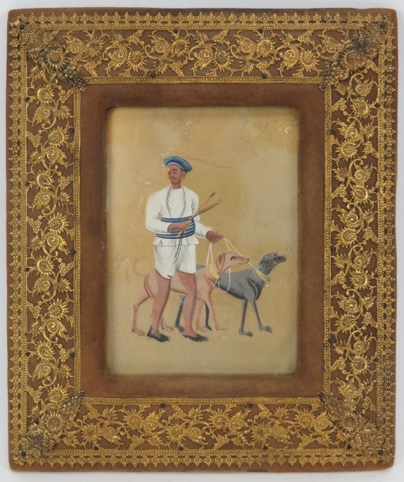 A Indian figural scene painting on mica depicting a man with hounds, late 19th/early 20th century.