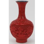 A Chinese cinnabar lacquer vase, 20th century. 20.8 cm height. Condition report: Some wear with age.