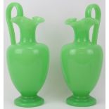 A matched pair of green opaline glass ewers, 19th century. Probably either French or Bohemian.