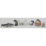 A group of six Royal Copenhagen porcelain animal figurines. Comprising two white rabbits, an otter