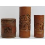 Three Chinese carved bamboo objects, 20th century. Comprising two large brush pots and a jar with
