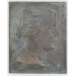 A bronze plaque depicting a portrait of a lady in profile, signed F Lessore and dated 1913.