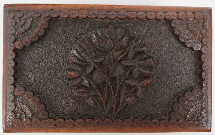 Two Indian carved wood objects, 20th century. Comprising an ornately carved box with hidden - Image 2 of 7