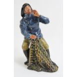 A Royal Doulton ’Sea Harvest’ figurine. Model number HN 2257. Green factory marks beneath. 7.1 in (