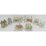 A group of Coalport and Staffordshire ceramic buildings. Comprising eight Coalport ceramic models