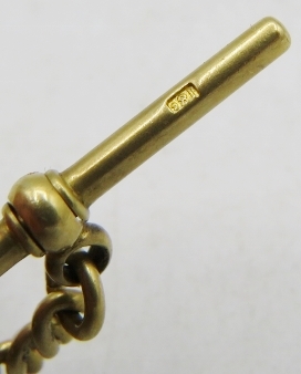 An 18ct gold Albert with 'T' bar and dog clip, with attached Queen Anne Guinea 1710 and a gold Louis - Image 3 of 3