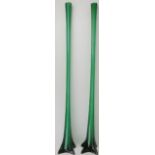 A very large European pair of emerald green glass floor standing vases, 20th century. Of tall,