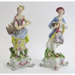 A pair of European porcelain figurines, probably 19th century. Iron red marks beneath. (2 items)