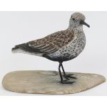 A Mike Wood hand carved and painted wooden sculpture of a Dunlin coastal wader bird. Very finely,