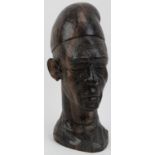 A North African carved hardwood bust of a man, 20th century. 26 cm height. Condition report: Minor