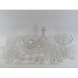 A collection of moulded and cut glass tableware items, 20th century. Including a bowl, tazza,