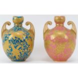 Two rare Royal Crown Derby twin handled vases, circa 1884-85. Both of ovoid form with scale handles,