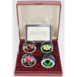 A set of four Scottish Caithness millefiori and lampwork glass paperweights of the Four Seasons